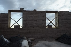 The unfinished wall of one of the Good Earth Lodges in Crow Agency.