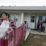 Deana Laforge, 71, and her sister, Janice Medicine Horse, 56, in the yard of their apartment in the Apsaalooke Elders Program temporary housing. Laforge shares the two-bedroom apartment with anywhere from five to 12 people, depending on how many members of her extended family stay over.