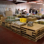People who qualify for the commodity food program choose food for their families at the distribution center. Unfortunately, the food is sometimes not enough to last through the month.