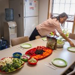 Barbara Braided Hair, 50, prepares a healthy lunch of food she purchased at the Lame Deer Trading Post, the only grocery store on the reservation. Braided Hair treated her family to lunch while at her work at the First Interstate Bank in Lame Deer.