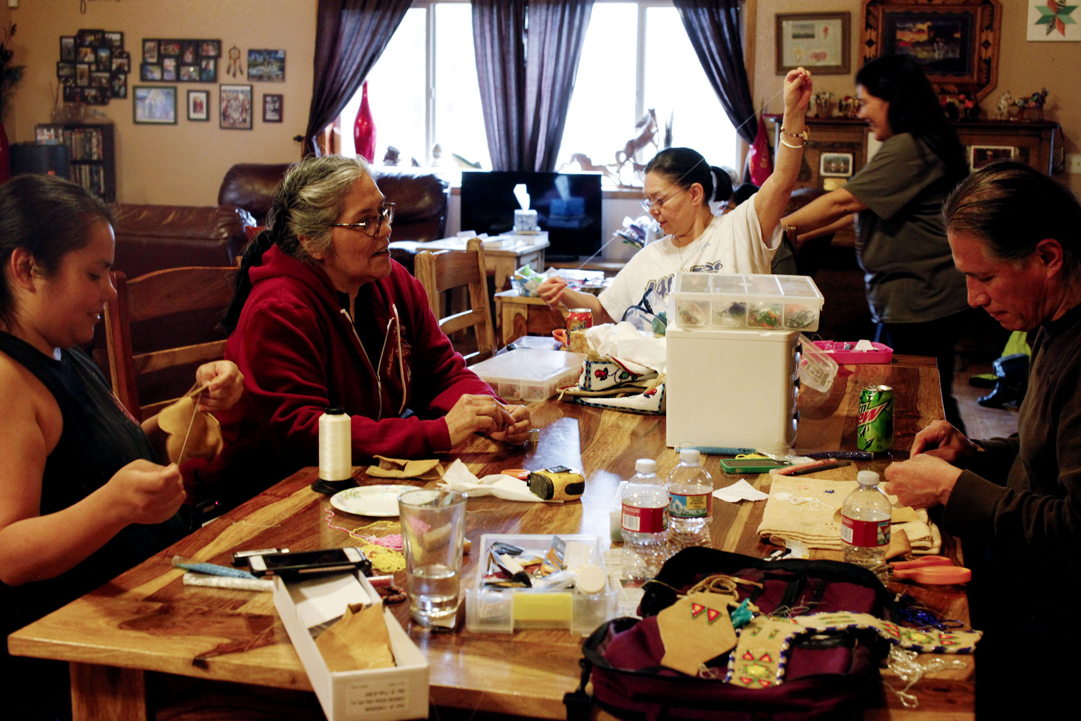 Flathead community members gather to socialize and make moccasins at Patty Stevens’ home. Stevens, describes her home as a safe haven. “I think you can heal or be well if you’re just doing things that are part of your culture and being around other people that are happy,” Stevens said.