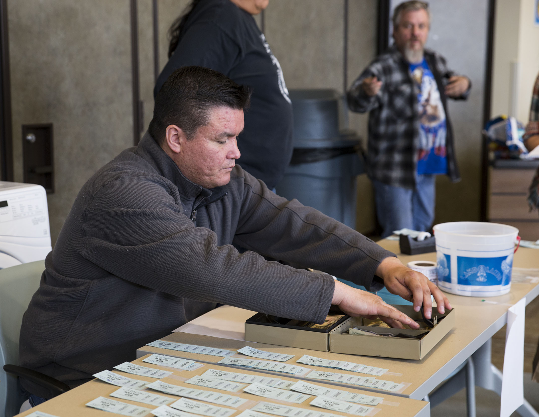 Wes Headdress, director of Veterans Affairs for the Fort Peck tribes, sells raffle tickets at a fundraiser on March 22, 2017. The annual event raises money to help pay for veterans’ transportation and hotel when they travel off the reservation for medical care.