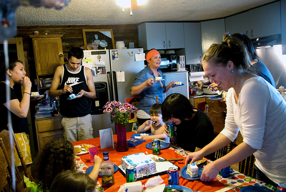 Javon Wing and her family gather in her parent’s kitchen to celebrate the 18th birthdays of her twin sons, Stephon and Jeremiah Wing.