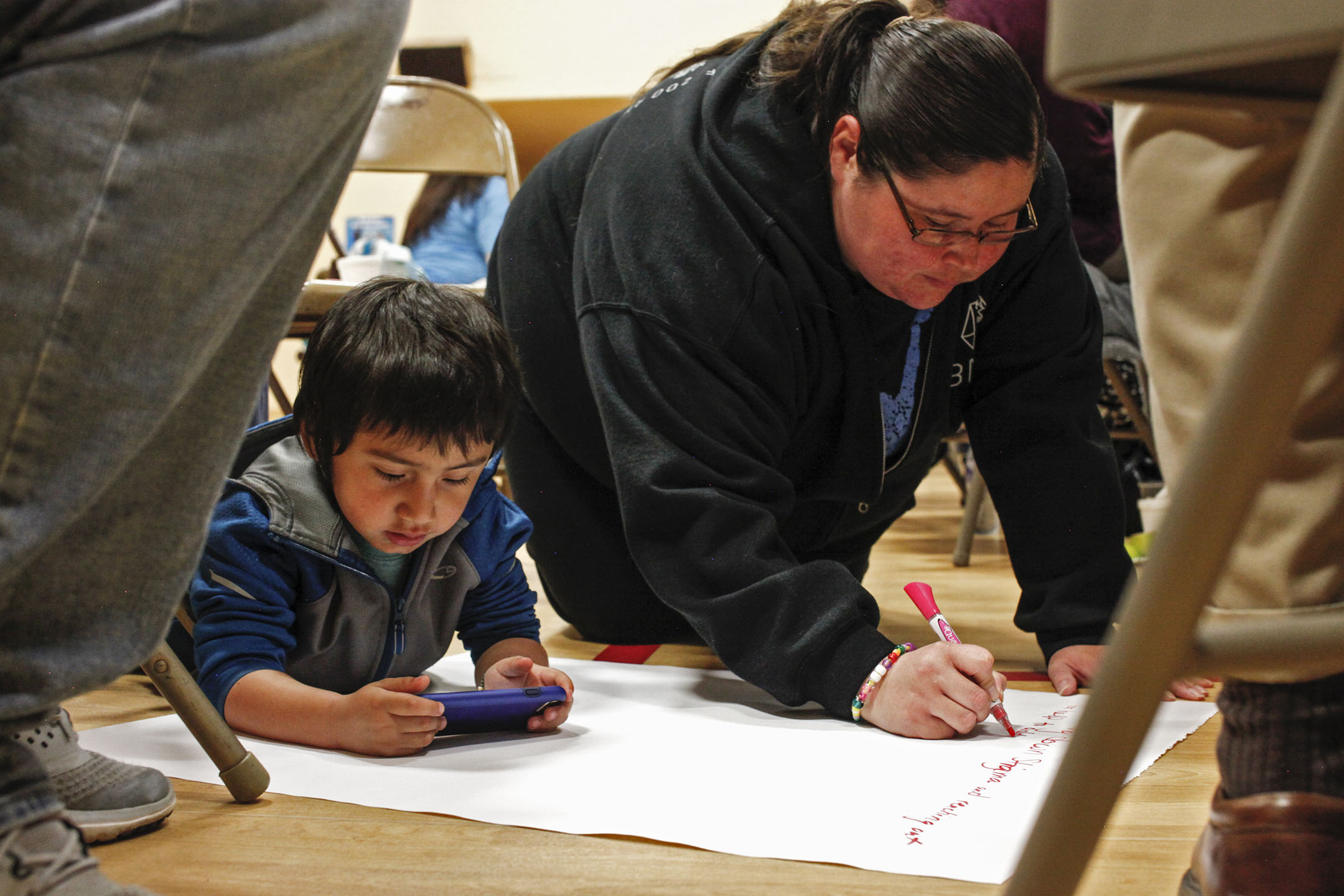 Megan Inmee, 26, and her nephew brainstorm ideas to combat suicide and mental illness on the Flathead Indian Reservation. Inmee lost her father to suicide in February. “I’m hoping after all this happens, tribal health makes changes so everybody can get the help they need,” Inmee said.