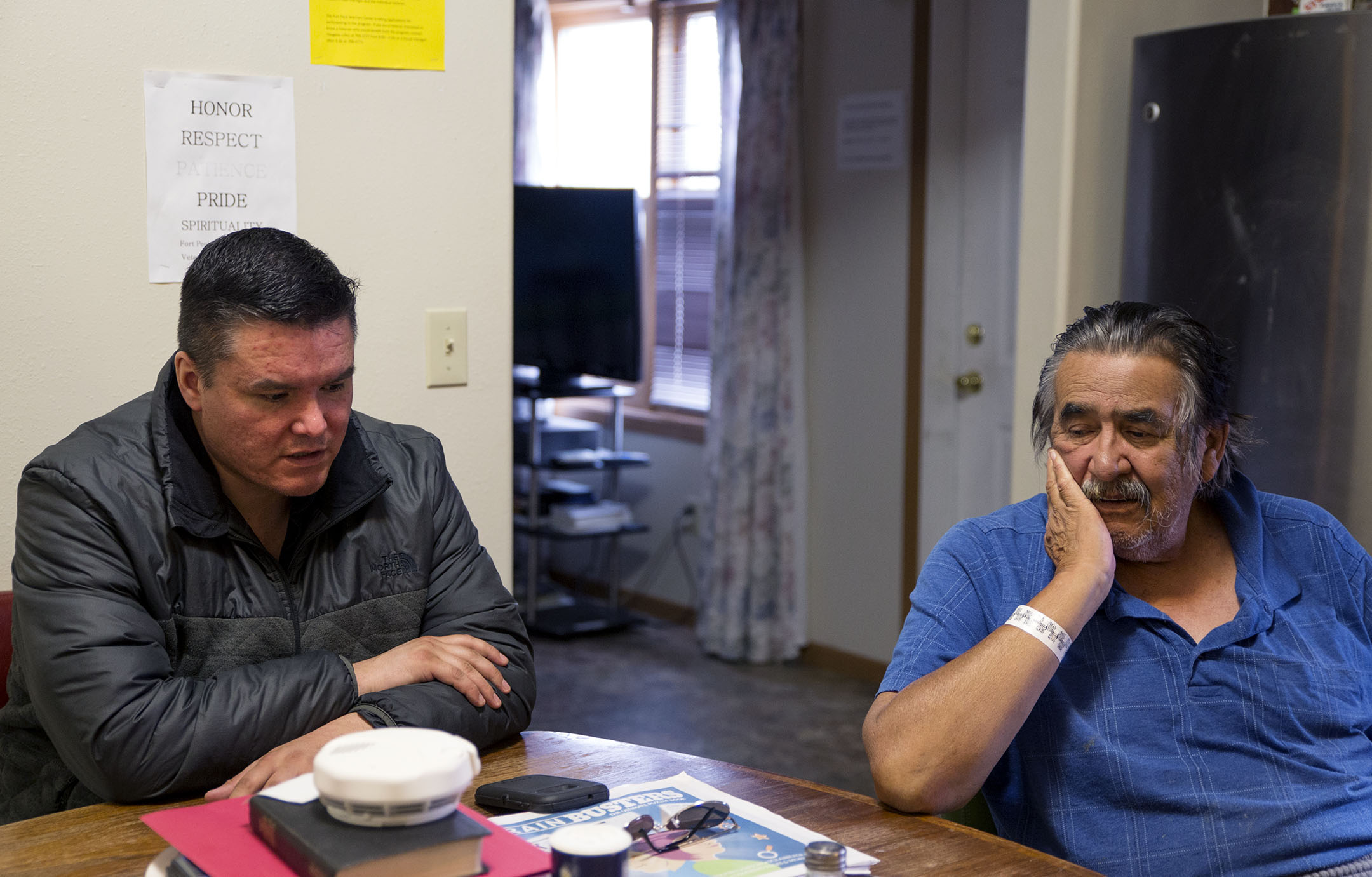 Wes Headdress, left, and Mitchell Headdress recount their experiences navigating health care between IHS and the VA as Native American veterans on the Fort Peck reservation.
