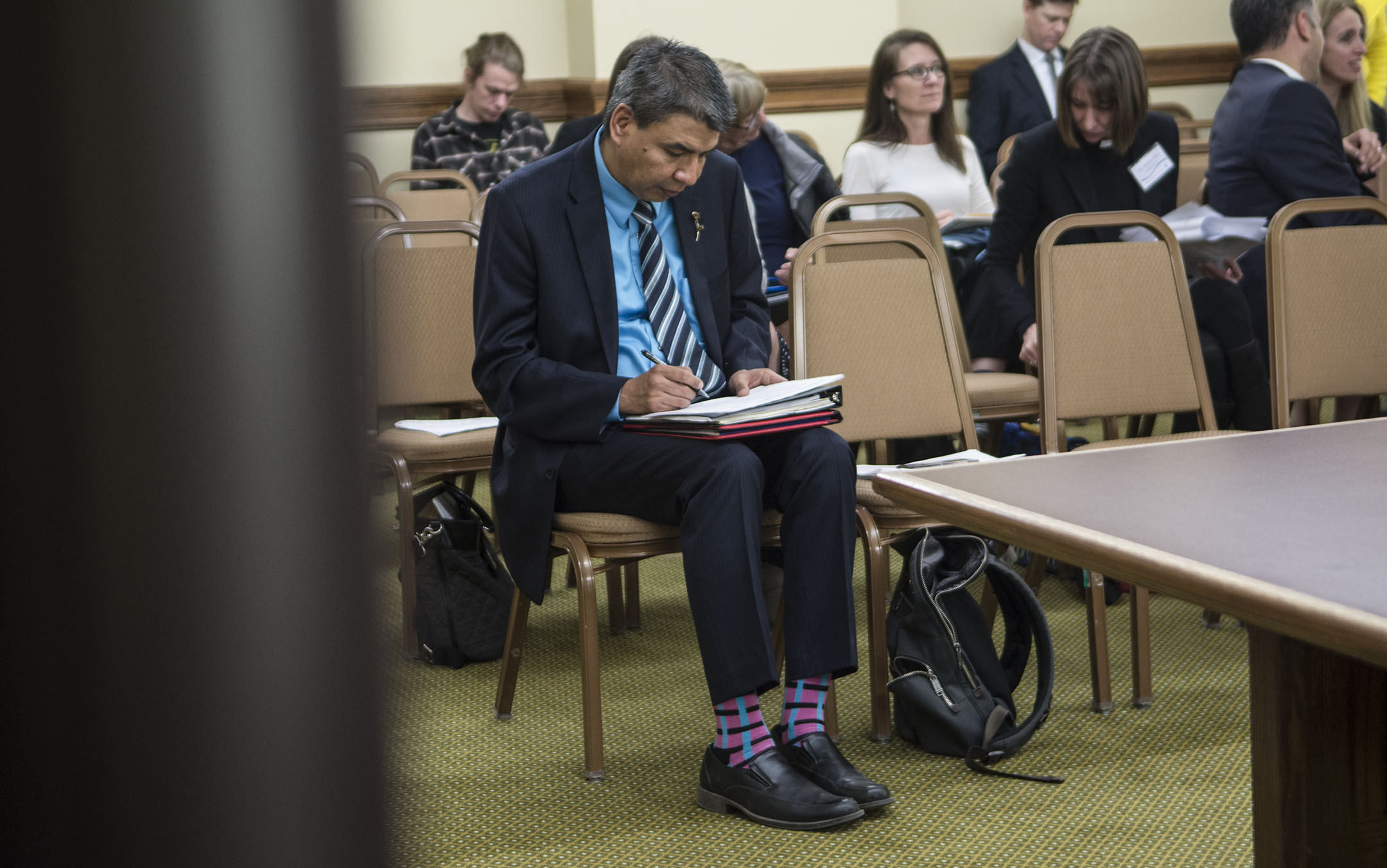 Preparing his notes before testifying in Helena, BirdRattler admits that whenever he speaks before the Blackfeet Tribal Council in Browning, their first question often involves what color socks he’s wearing.